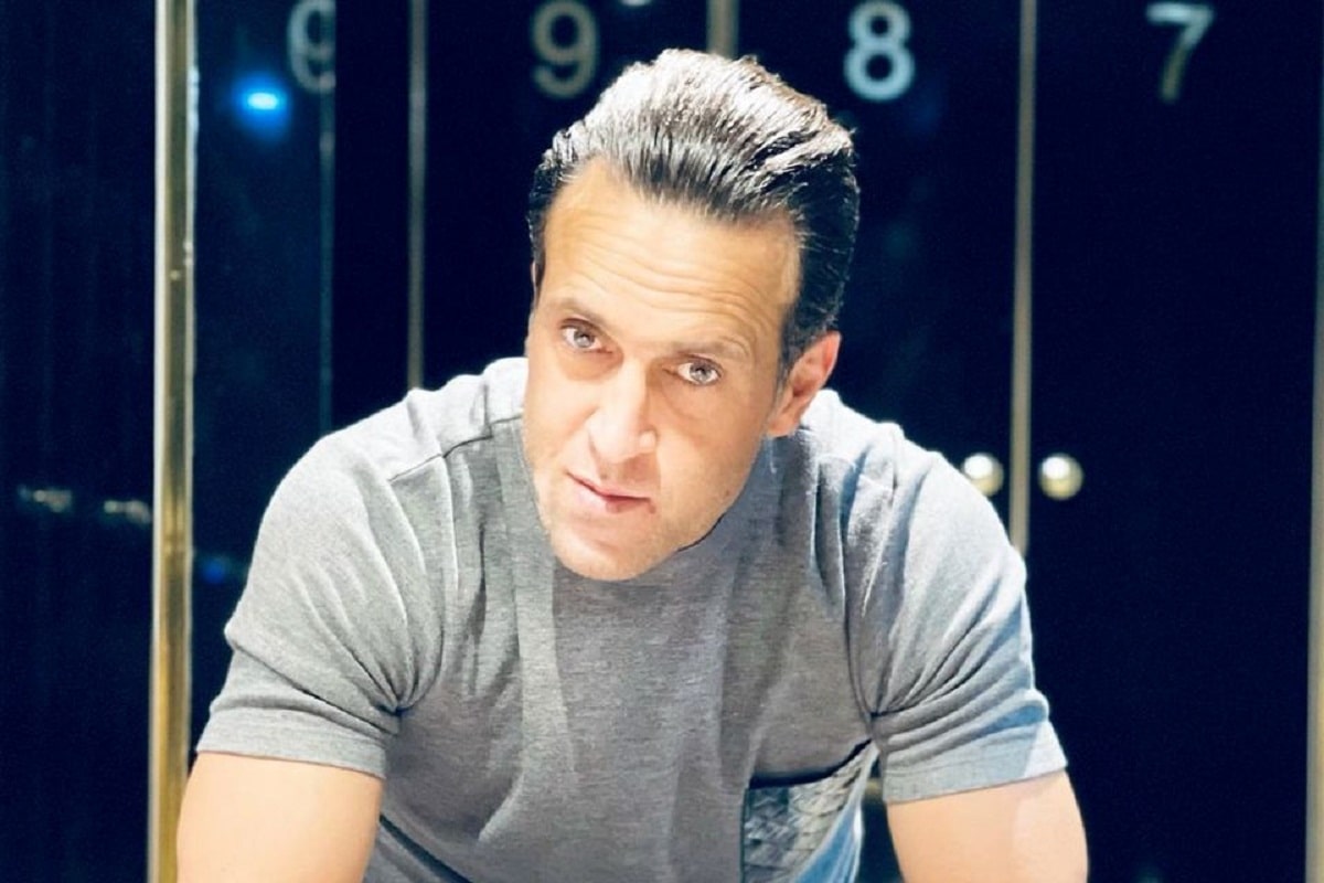 عکس| اثبات بی سوادی علی کریمی در توهین این سلبریتی فراری به همسر شهید