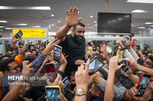 'عکس| واکنش هادی چوپان به رفتار زشت با کودکان در مراسم استقبال'
