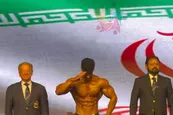 عکس| احترام نظامی قهرمان پرورش اندام آسیا به سرود ملی ایران