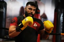 'فیلم| امیر علی اکبری حریف را خرد کرد؛ قهرمان MMA قدرت مشت زنی خود را به رخ کشید'