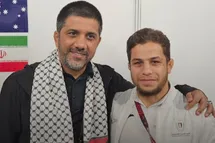 'عکس| دیدار علیرضا دبیر با کشتی گیر فلسطینی'